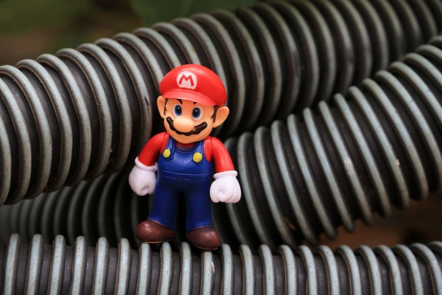 Universos que perduran: La huella imborrable de las grandes franquicias en la historia del entrenamiento interactivo Figura de Super Mario en coleccionables de videojuegos